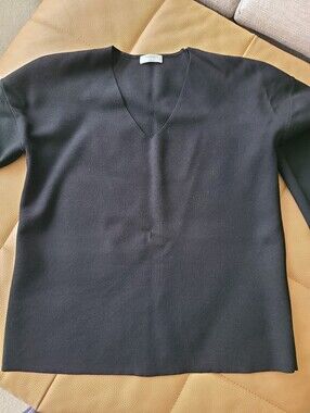 The Group By Babaton V-neck Souvenir Sweater